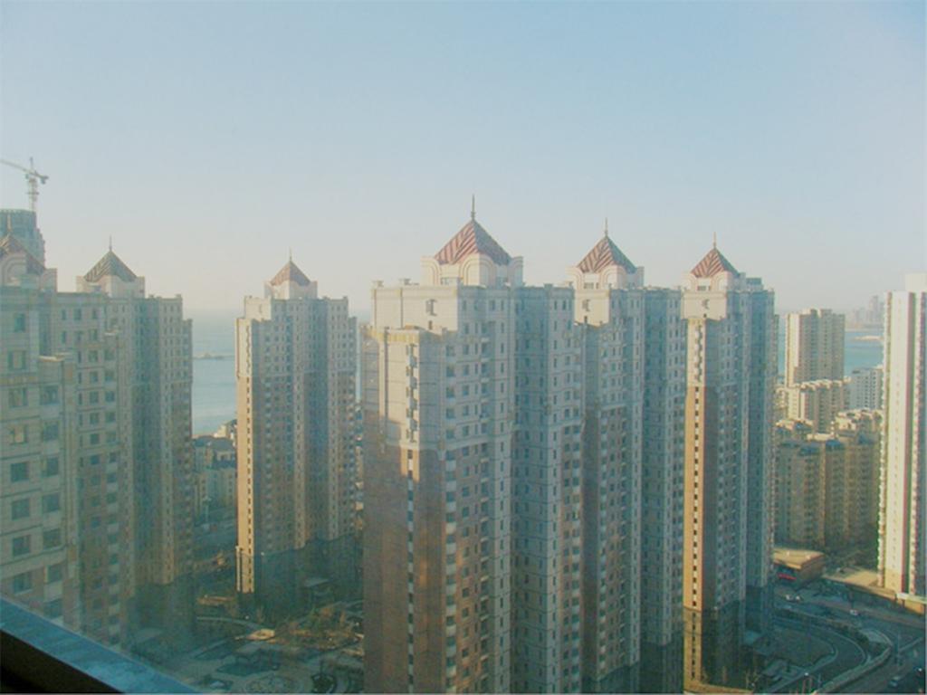 Xinghai Zhilian Apartment Далиен Екстериор снимка