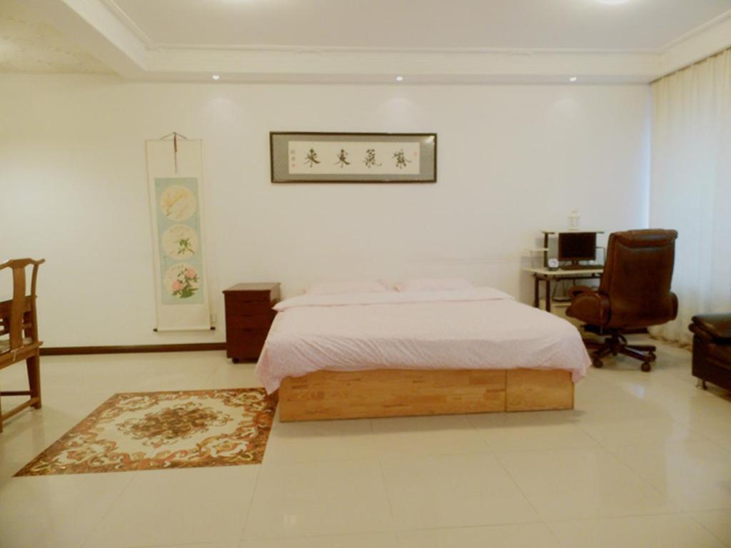 Xinghai Zhilian Apartment Далиен Стая снимка